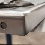 ATM Satinatura metalli. Pezzo saldato levigato e satinato da pezzo, eseguita satinatura del componente saldato acciaio inox 304